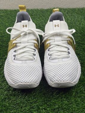 Under Armour Women’s HOVR Project Rock 4 Training Sneakers in White and Gold